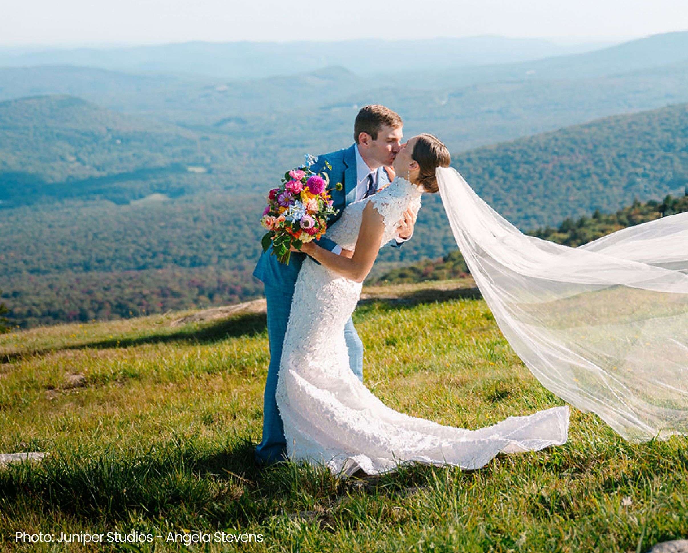 married couple on a mountain